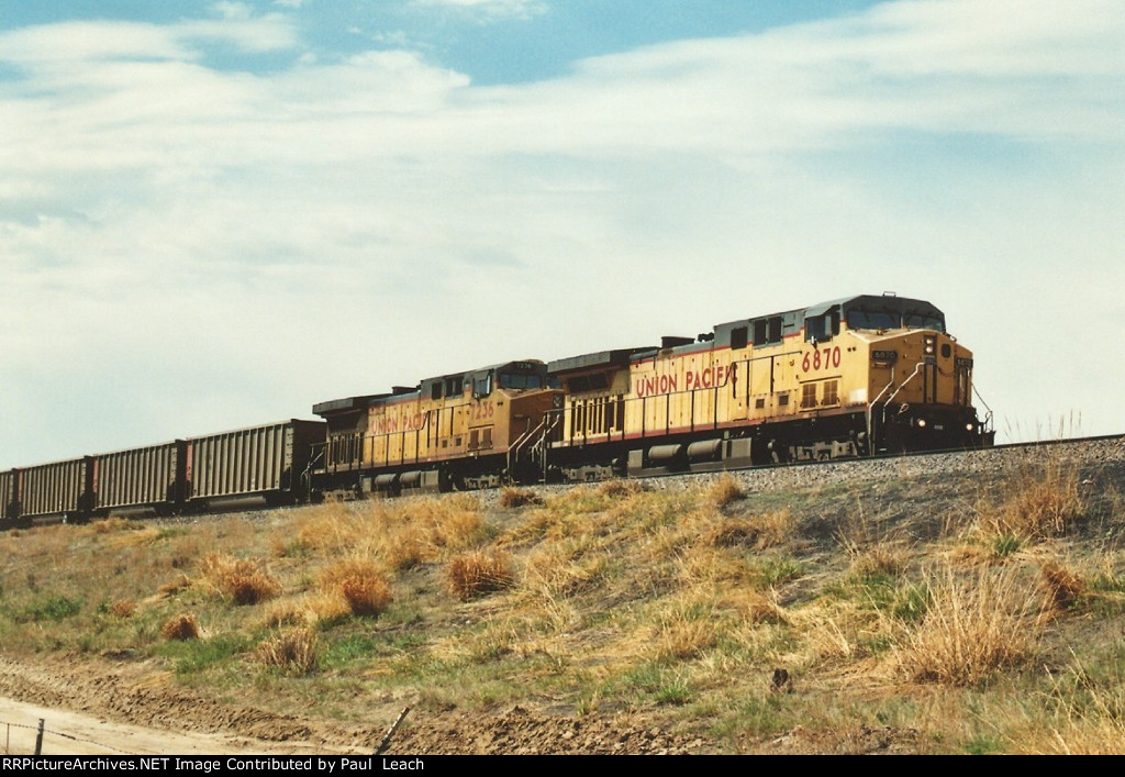 Empty coal train rolls north